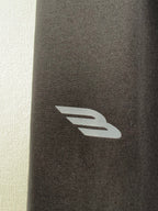 Balenciaga pants with dark fabric and white graphic logo