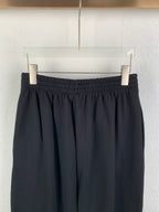 Balenciaga pants with gathered elastic waistband and dark drape