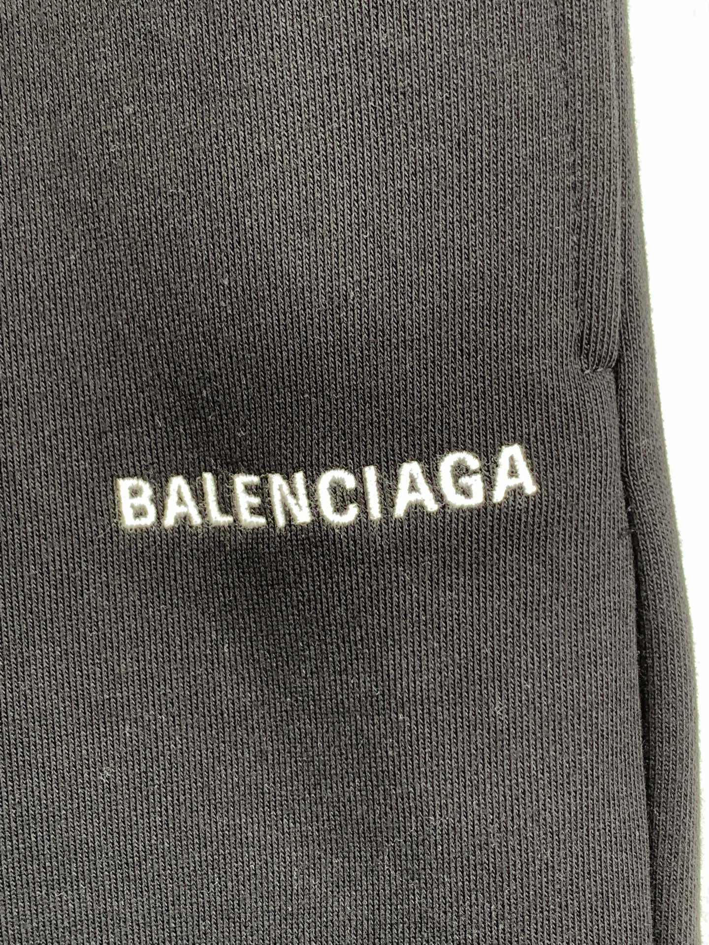 Dark knit shorts leg with BALENCIAGA logo print