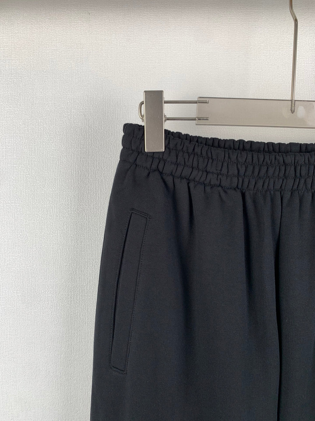 Balenciaga black pants with elastic waistband and side pocket detail