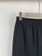 Balenciaga black pants with elastic waistband and side pocket detail