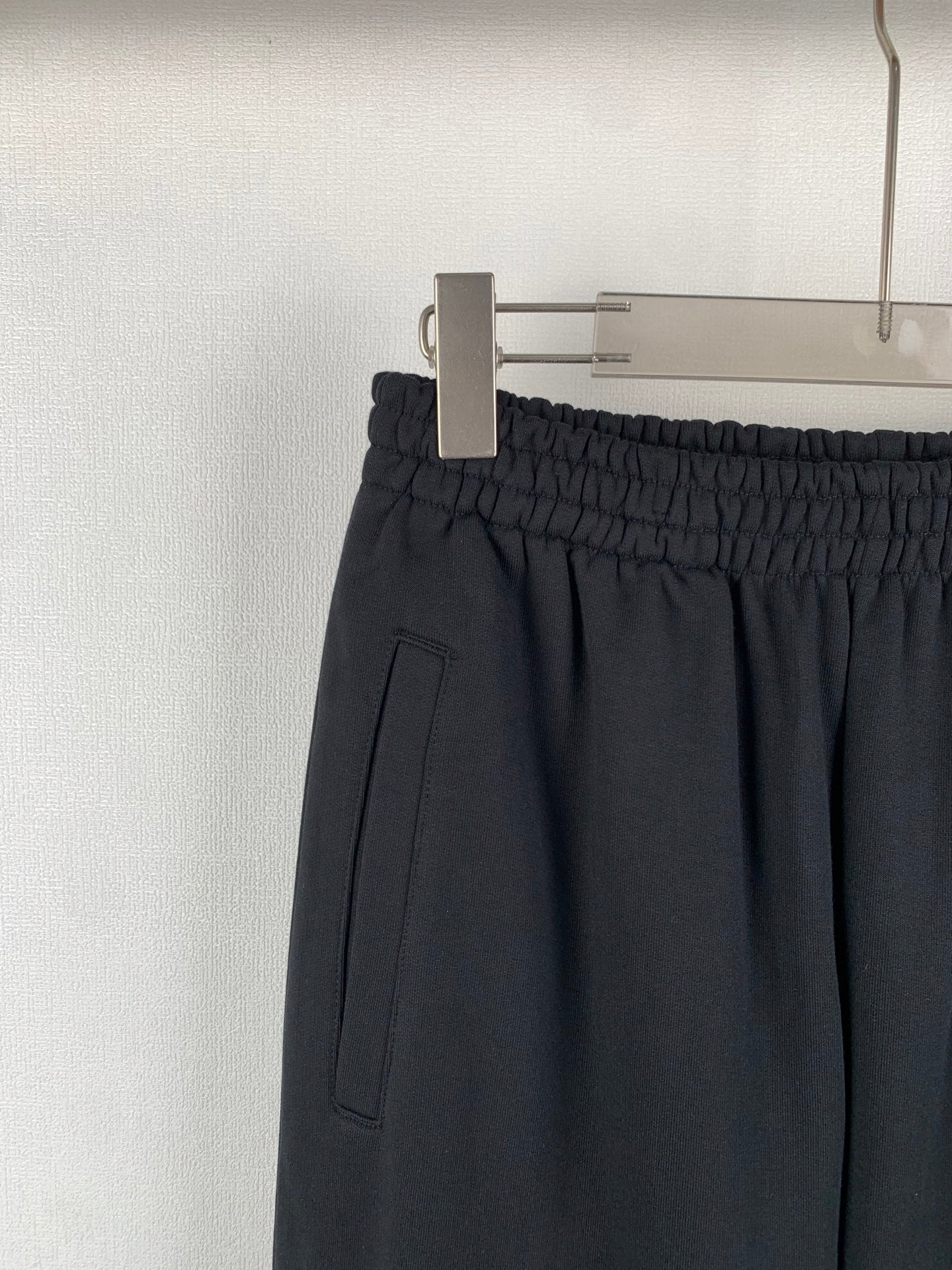 Balenciaga black pants with elastic waistband and side pocket detail