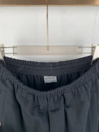 Balenciaga dark pants with elastic waistband and gathered front