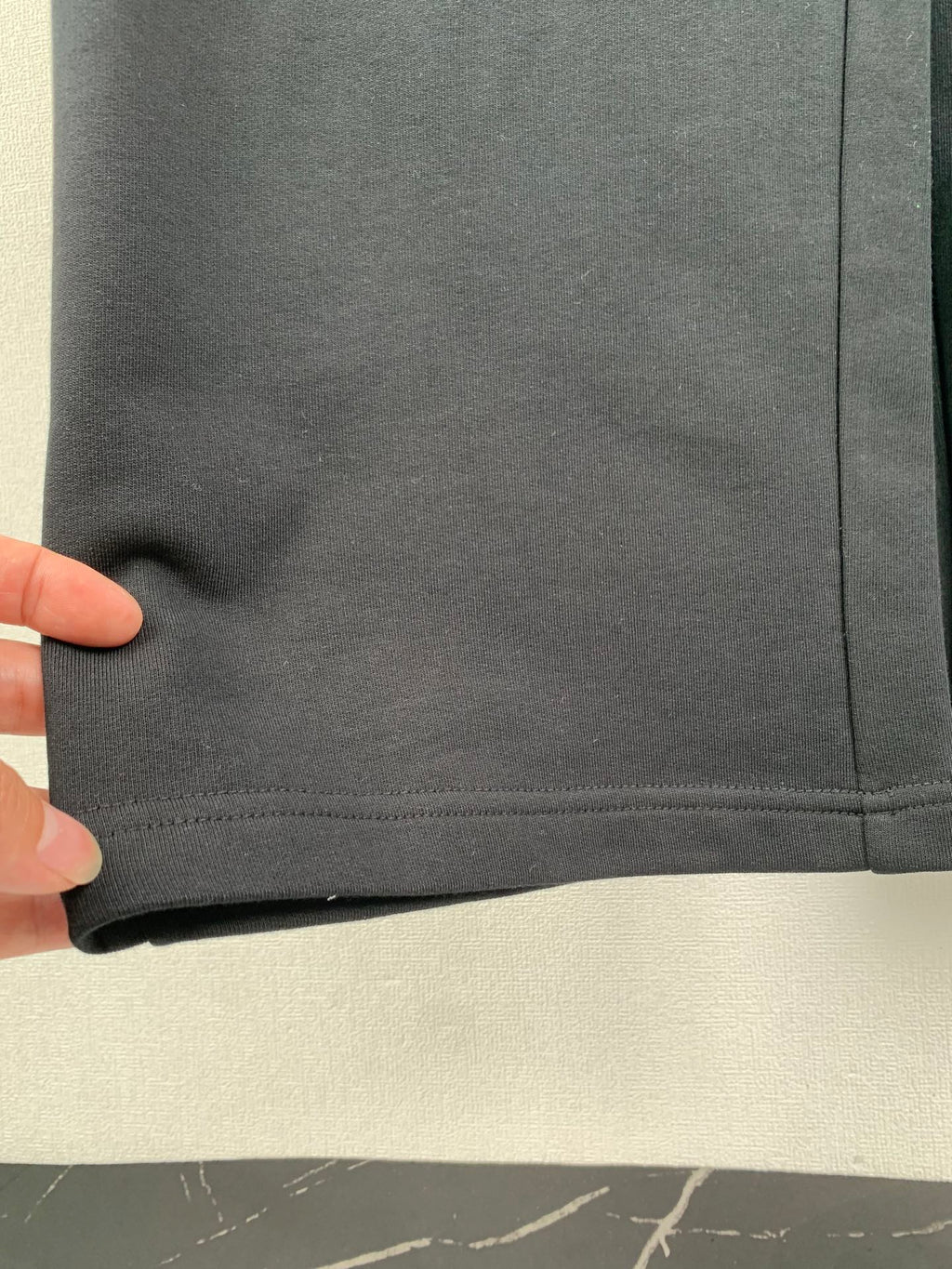 Balenciaga black pant hem with stitched cuff seam