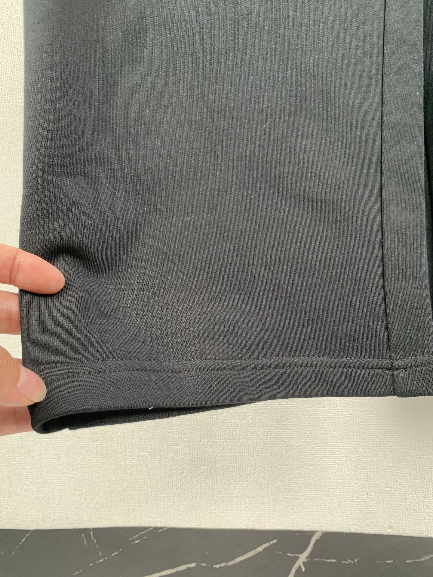 Balenciaga black pant hem with stitched cuff seam