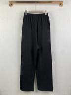 Balenciaga black wide-leg pants with elastic waist and side pockets