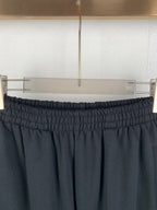 Balenciaga black elastic-waist pants with gathered waistband and side pockets