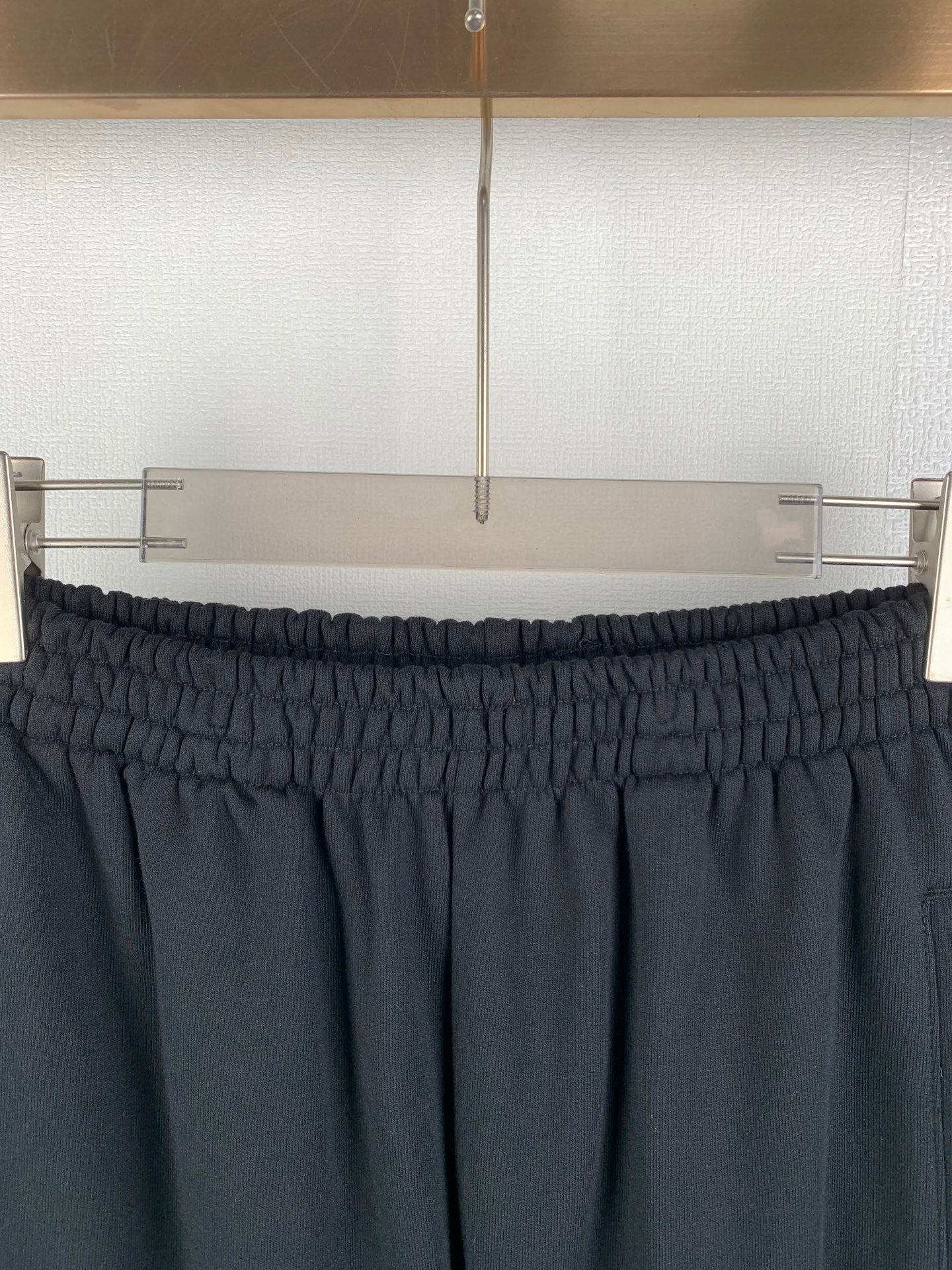 Balenciaga black elastic-waist pants with gathered waistband and side pockets