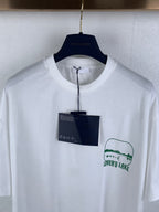 White crewneck T-shirt with green "LOVER'S LAKE" logo print, front close-up