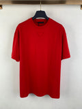 Red short-sleeve T-shirt on a hanger, crew neck, embroidered triangle logo at chest.