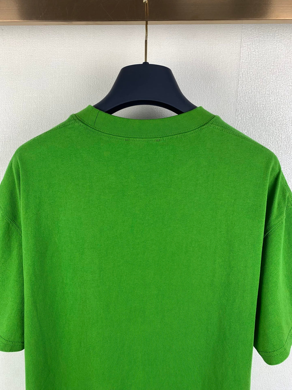 Prada short-sleeve T-shirt in bright green, close-up of back crew collar