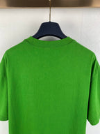 Prada short-sleeve T-shirt in bright green, close-up of back crew collar