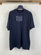 Navy Prada crewneck T-shirt on hanger with front hang tags