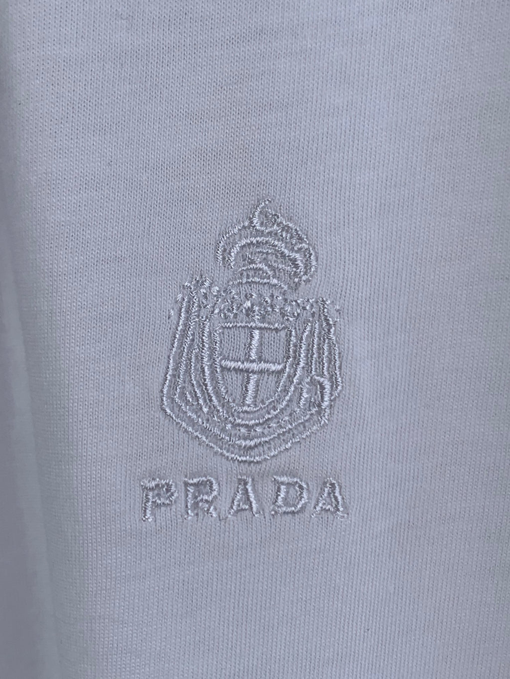 White T-shirt with embroidered PRADA crest logo