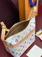 Louis Vuitton multicolor monogram crossbody bag with open zipper and tan interior