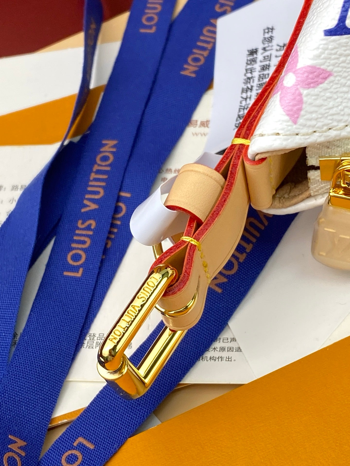 Louis Vuitton bag blue strap with gold-tone clasp hardware