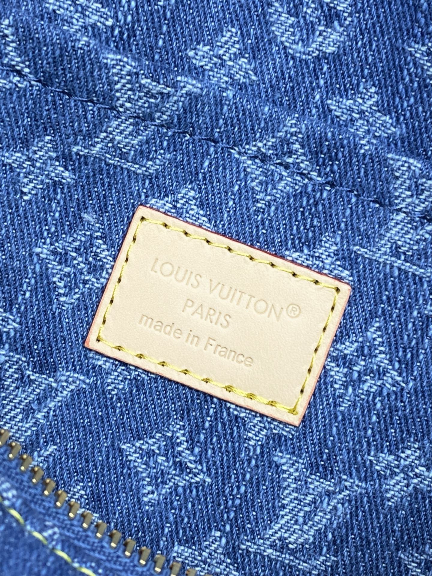 Louis Vuitton Paris made in France label patch on blue monogram canvas