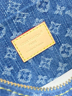 Louis Vuitton blue monogram fabric patch with yellow border and brand text