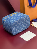 Louis Vuitton blue monogram vanity bag with round gold zipper and leather trim