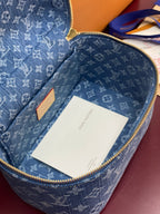 Louis Vuitton blue monogram vanity bag open, interior with white tag card