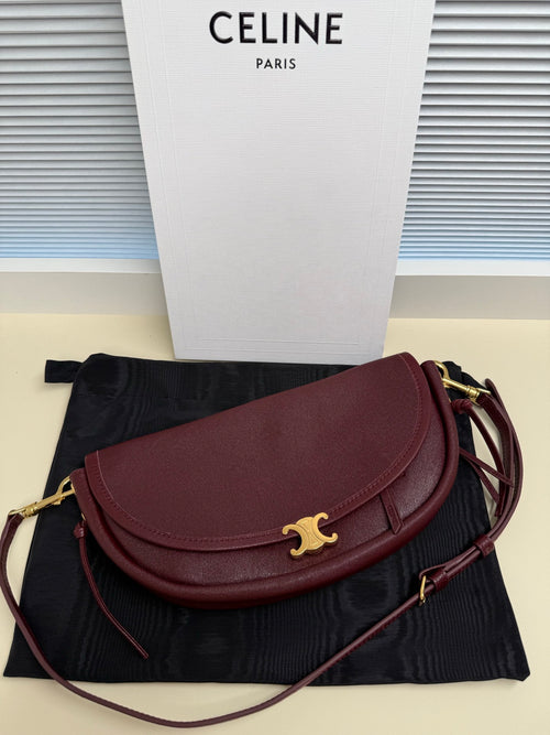 Celine crossbody bag, burgundy leather with gold clasp and flap front