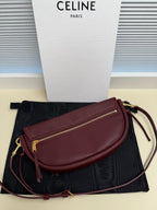 Celine crossbody bag, burgundy flap with gold zipper pocket and strap