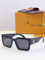 Louis Vuitton sunglasses with dark blue square frames and dark lenses, LV logo on temple.