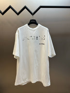 Balenciaga T-shirt in white with front splatter graphic and BALENCIAGA logo