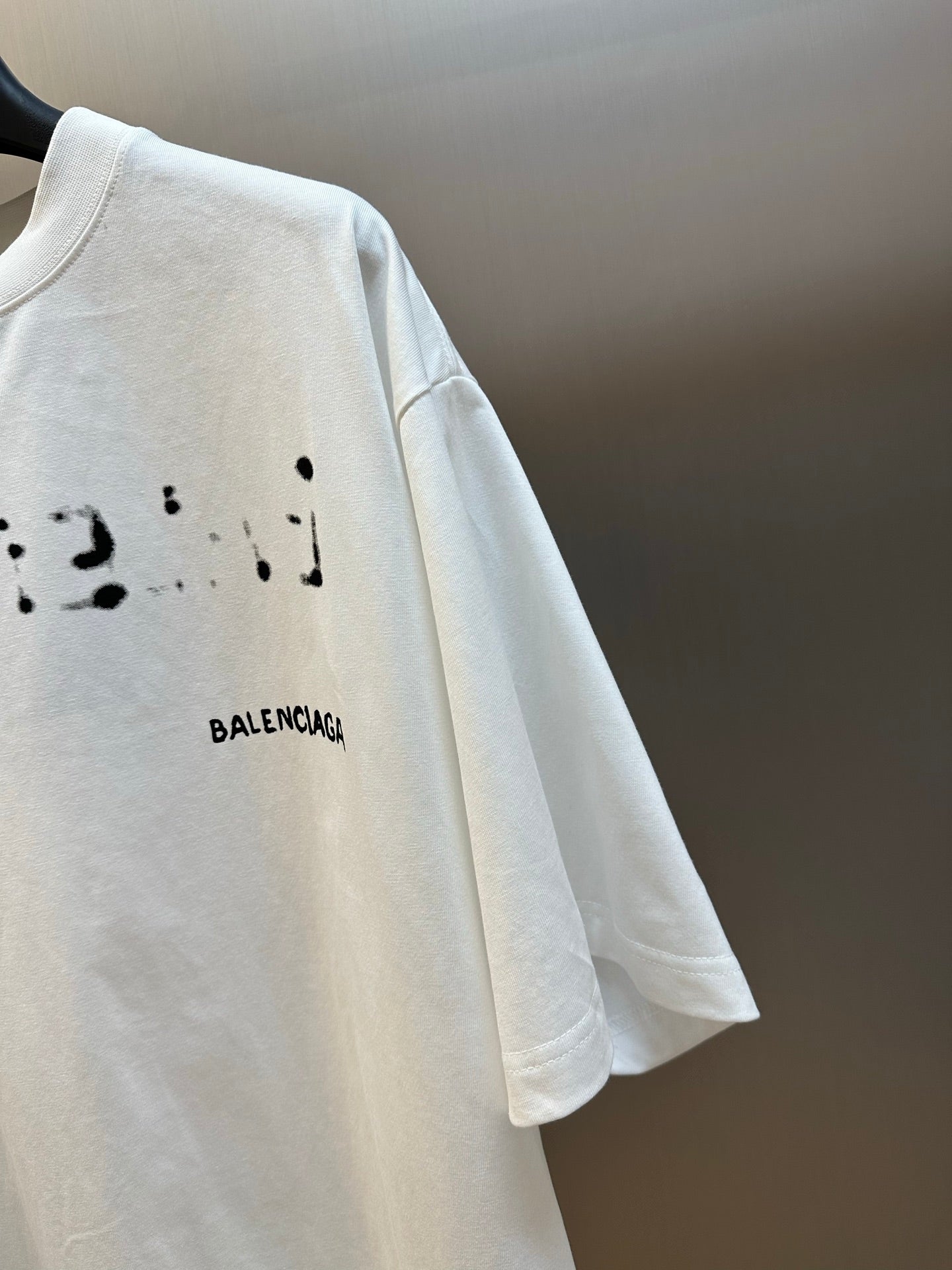 Balenciaga T-shirt in white with BALENCIAGA logo on chest and splatter marks