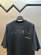 Balenciaga short-sleeve T-shirt in dark gray with BALENCIAGA chest print and crew neck.