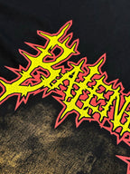 Dark T-shirt close-up of colorful neon jagged text graphic