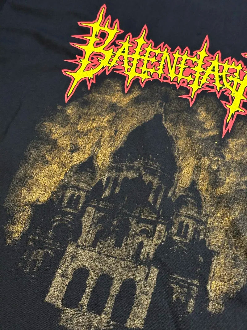 Balenciaga T-shirt graphic close-up of yellow skyline under red star letters