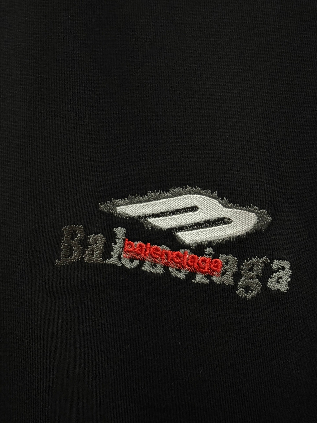 Black T-shirt with Balenciaga logo graphic in white and red