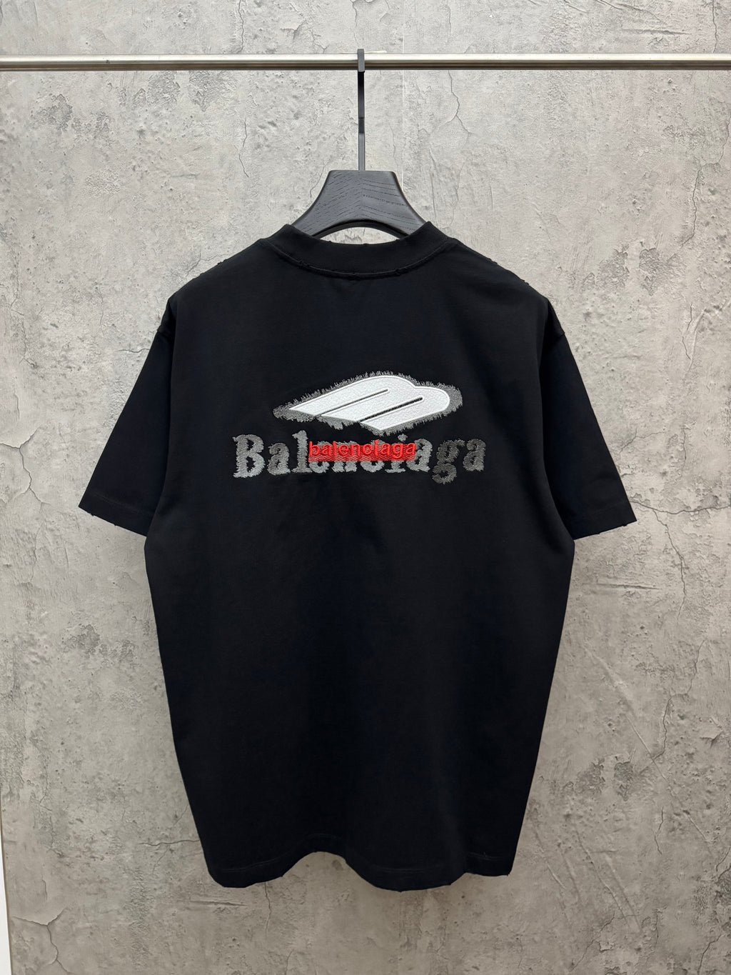 Black crewneck T-shirt with large back graphic logo print