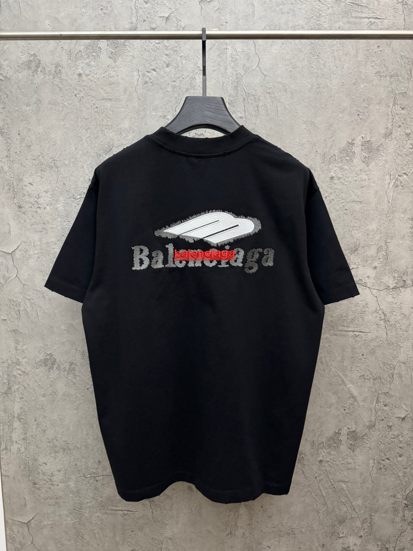 Black crewneck T-shirt with large back graphic logo print