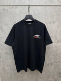 Black crewneck T-shirt with small graphic logo on left chest