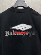 Black T-shirt with large white and red Balenciaga logo across chest