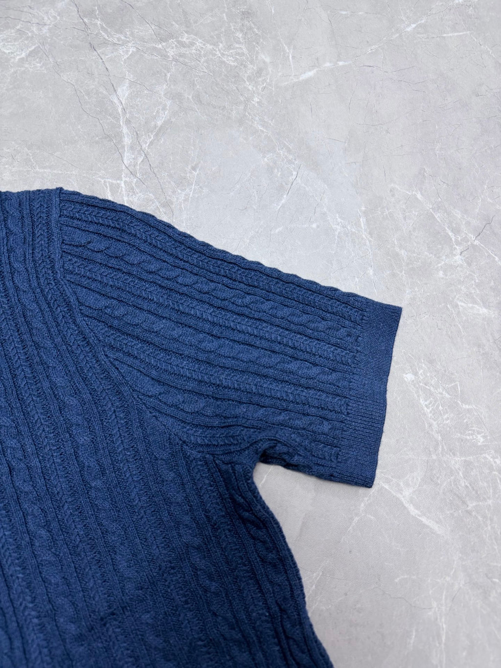 Ralph Lauren blue knit polo shirt sleeve with ribbed cuff
