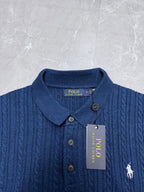 Ralph Lauren polo knit shirt in blue with buttons, collar, and horse logo