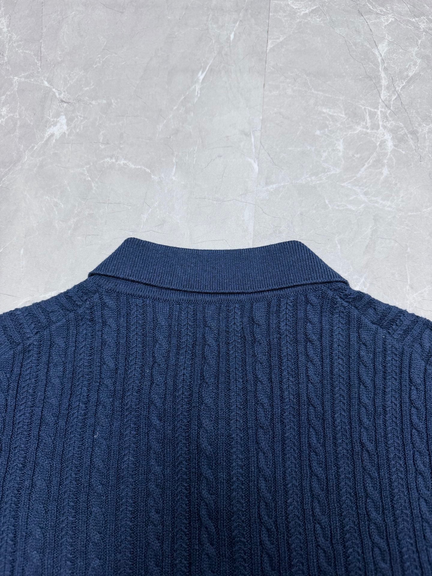 Ralph Lauren blue cable-knit polo shirt back with ribbed collar