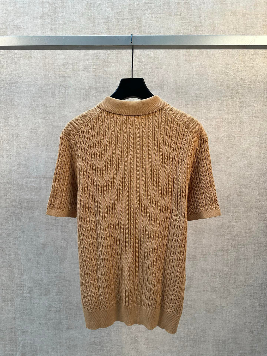 Tan cable-knit polo shirt back with short sleeves and ribbed collar