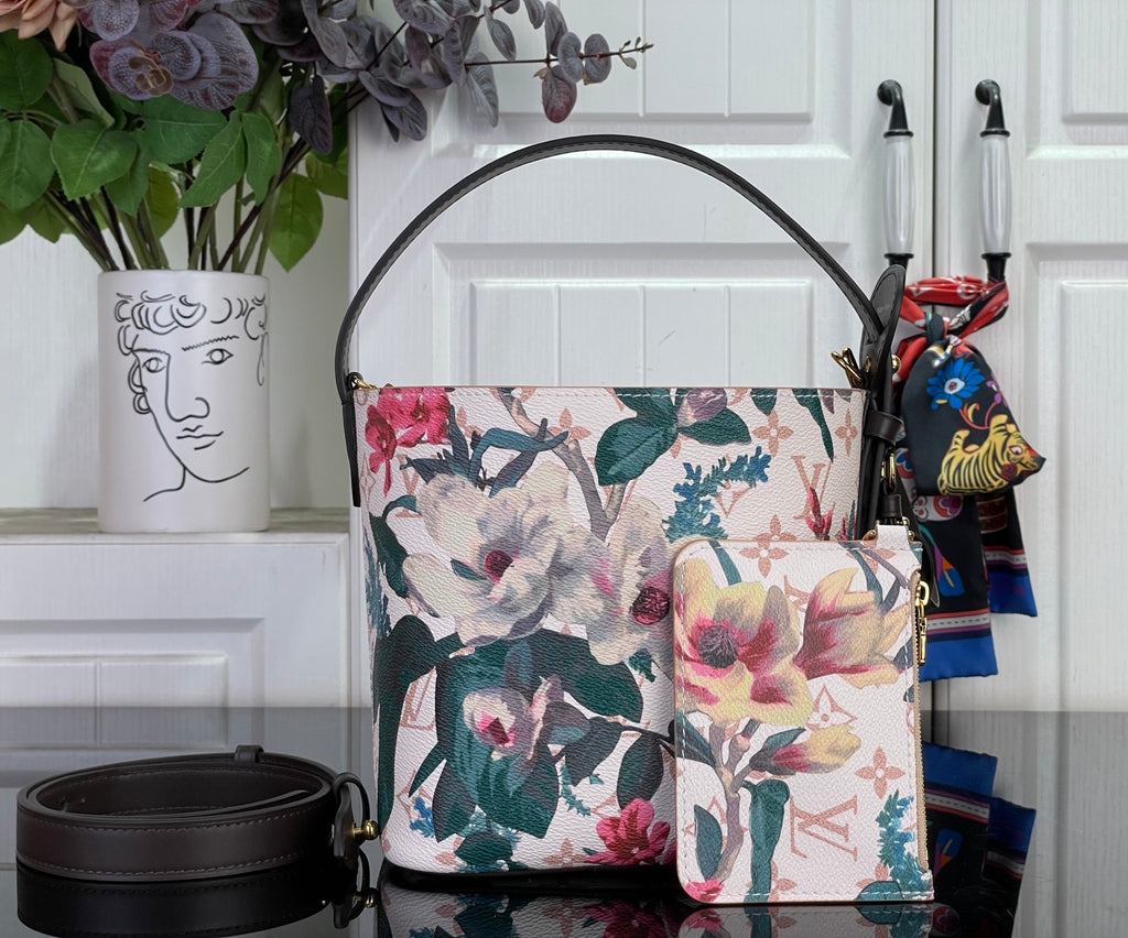 Louis Vuitton shoulder bag with floral multicolor canvas and black leather top handle