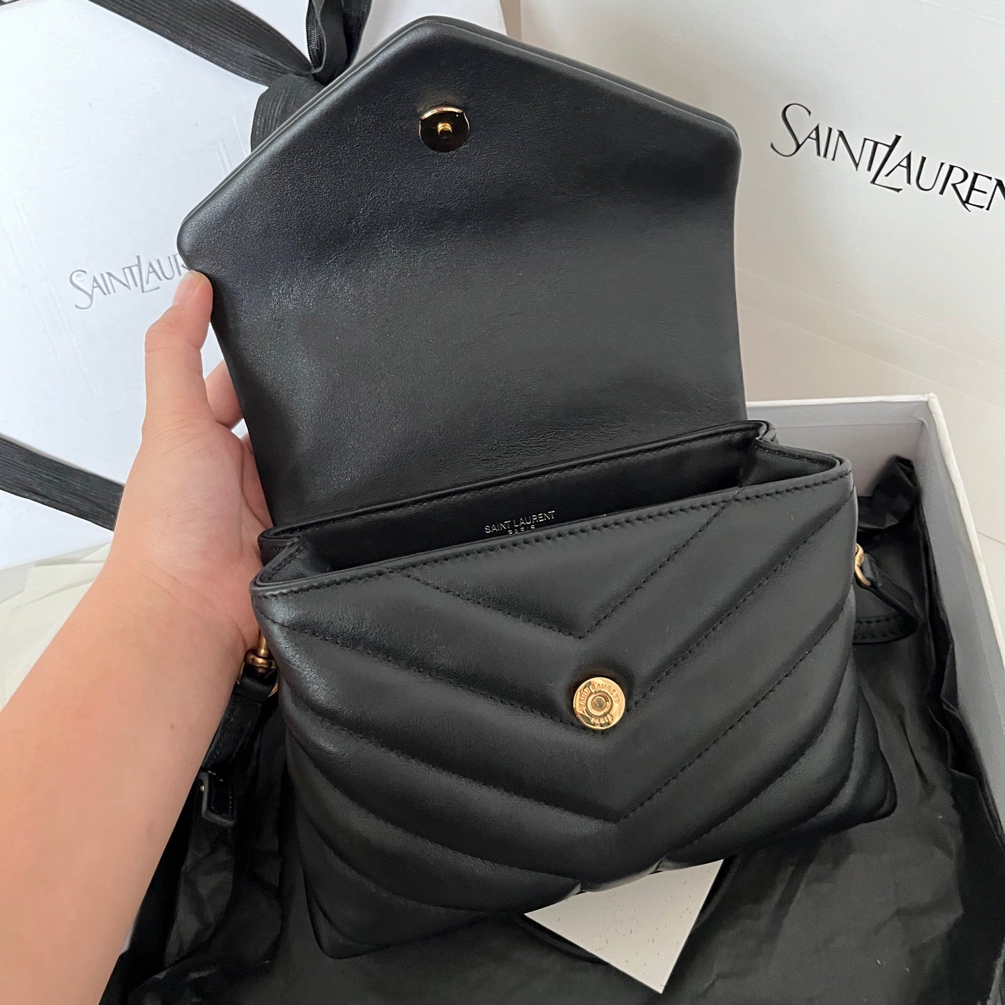 YSL Saint Laurent quilted leather mini bag, black, with gold button