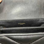 SAINT LAURENT PARIS leather bag label on black interior lining