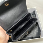 YSL Saint Laurent black leather bag interior with chain strap, open top