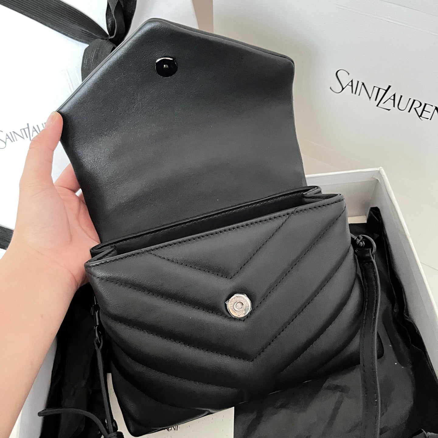Mini quilted leather shoulder bag with top flap and snap closure, dark gray-black