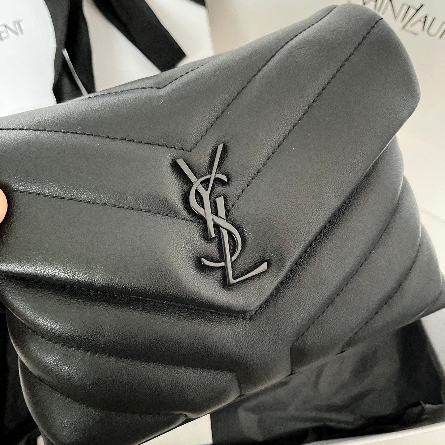 Quilted leather flap with YSL monogram clasp, dark gray-black