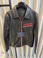 Prada black leather jacket with red zipper trim and chest logo stripe