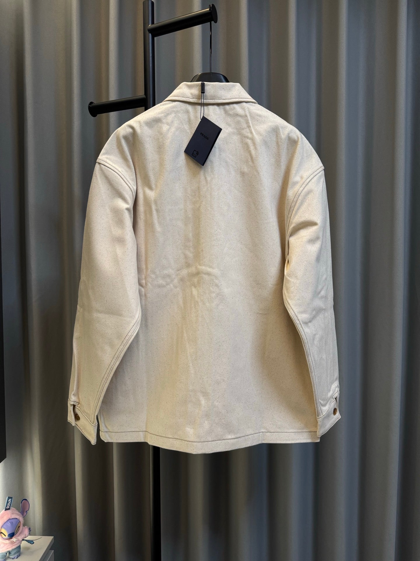 Prada beige canvas jacket back view, stand collar and full-length zipper