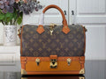 Louis Vuitton monogram handbag with tan leather trim and gold-tone front hardware